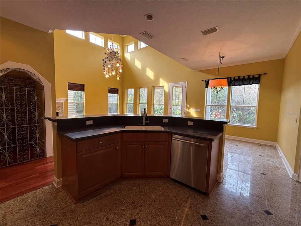 800 North End Street St. Augustine, FL 32095 - Photo 23 of 52 a kitchen with a sink and a mirror