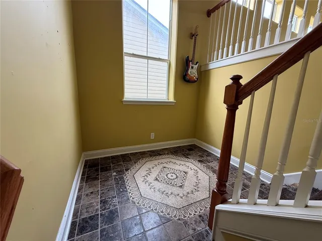 a view of a livingroom with wooden floor