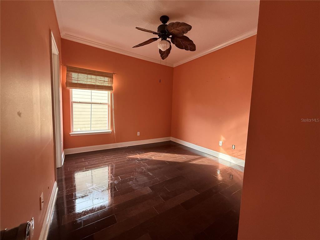800 North End Street St. Augustine, FL 32095 - Photo 38 of 52 a view of empty room with wooden floor and fan