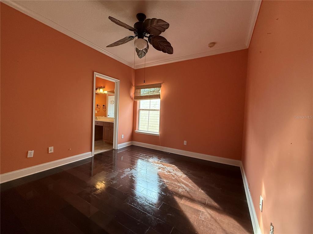800 North End Street St. Augustine, FL 32095 - Photo 40 of 52 a view of an empty room with a window and wooden floor