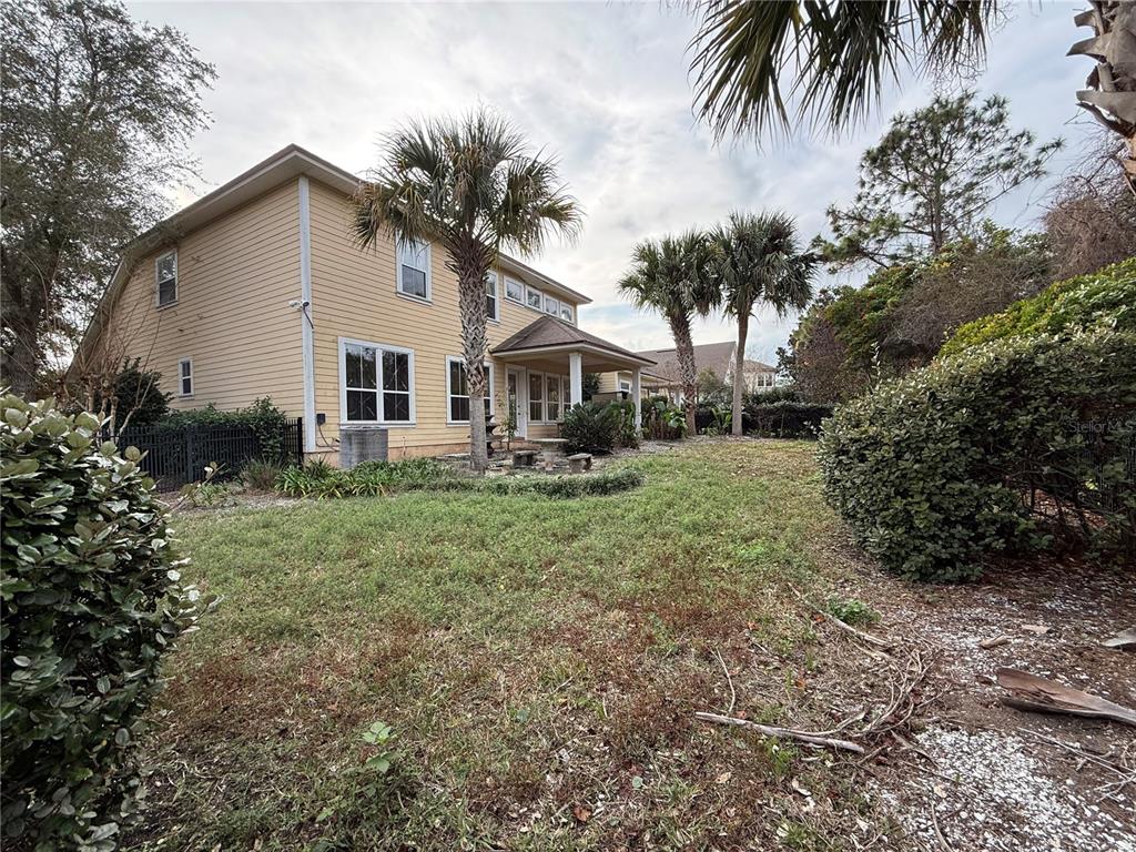 800 North End Street St. Augustine, FL 32095 - Photo 50 of 52 a front view of house with yard and green space