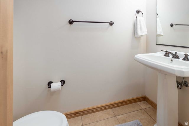 5168 Fairview Loop, Unit C604 Eden, UT 84310 - Photo 15 of 53 Bathroom with light tile patterned flooring and toilet