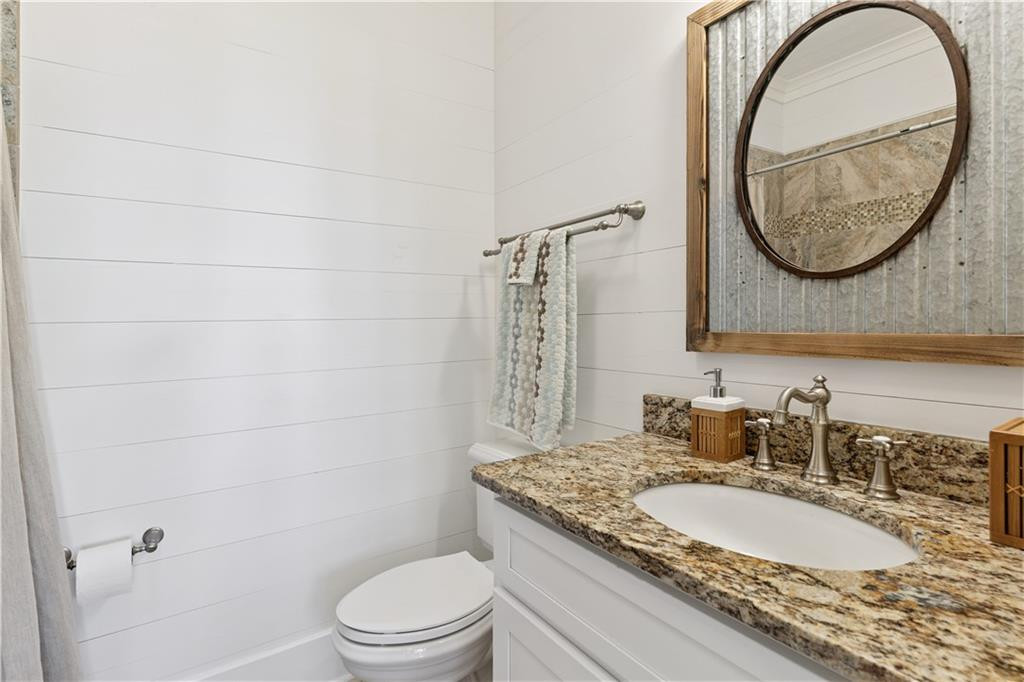 4316 5th Street St. Simons Island, GA 31522 - Photo 35 of 58 Upstairs bedroom bathroom