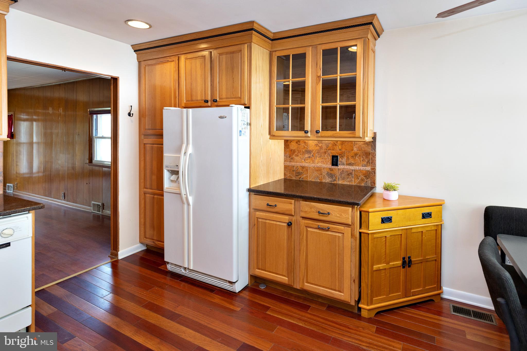 503 Pasadena Drive Magnolia, NJ 08049 - Photo 3 of 43 a kitchen with stainless steel appliances granite countertop a refrigerator and a stove next to a window
