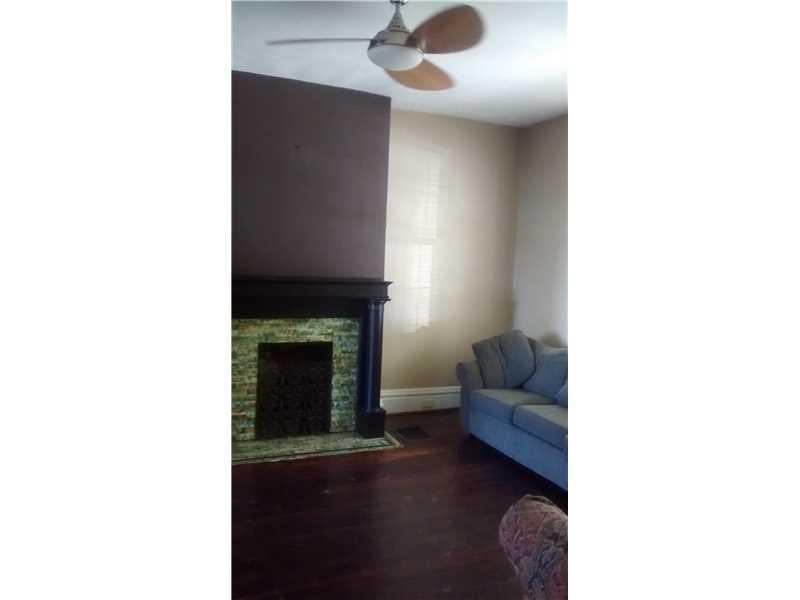910 Spring Street Braddock, PA 15104 - Photo 5 of 19 Living Room.