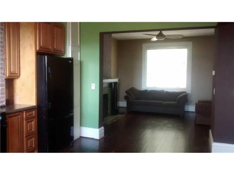 910 Spring Street Braddock, PA 15104 - Photo 6 of 19 Living Room.