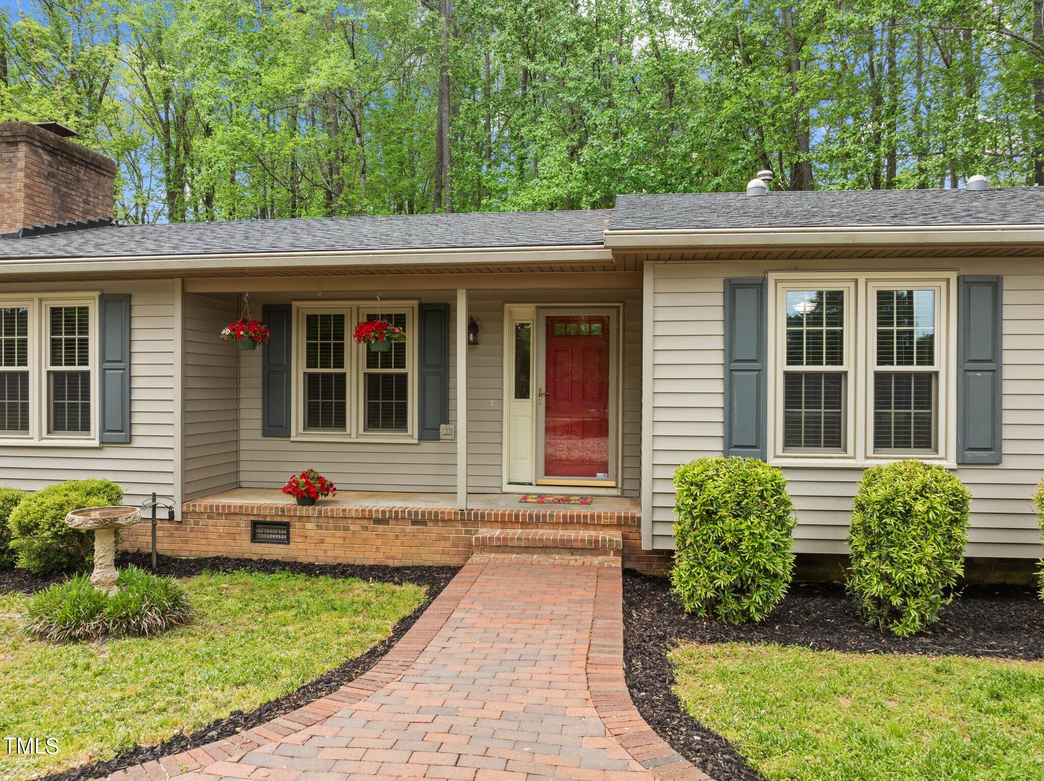 1901 Nipper Road Raleigh, NC 27614 - Photo 4 of 57 a front view of a house with garden