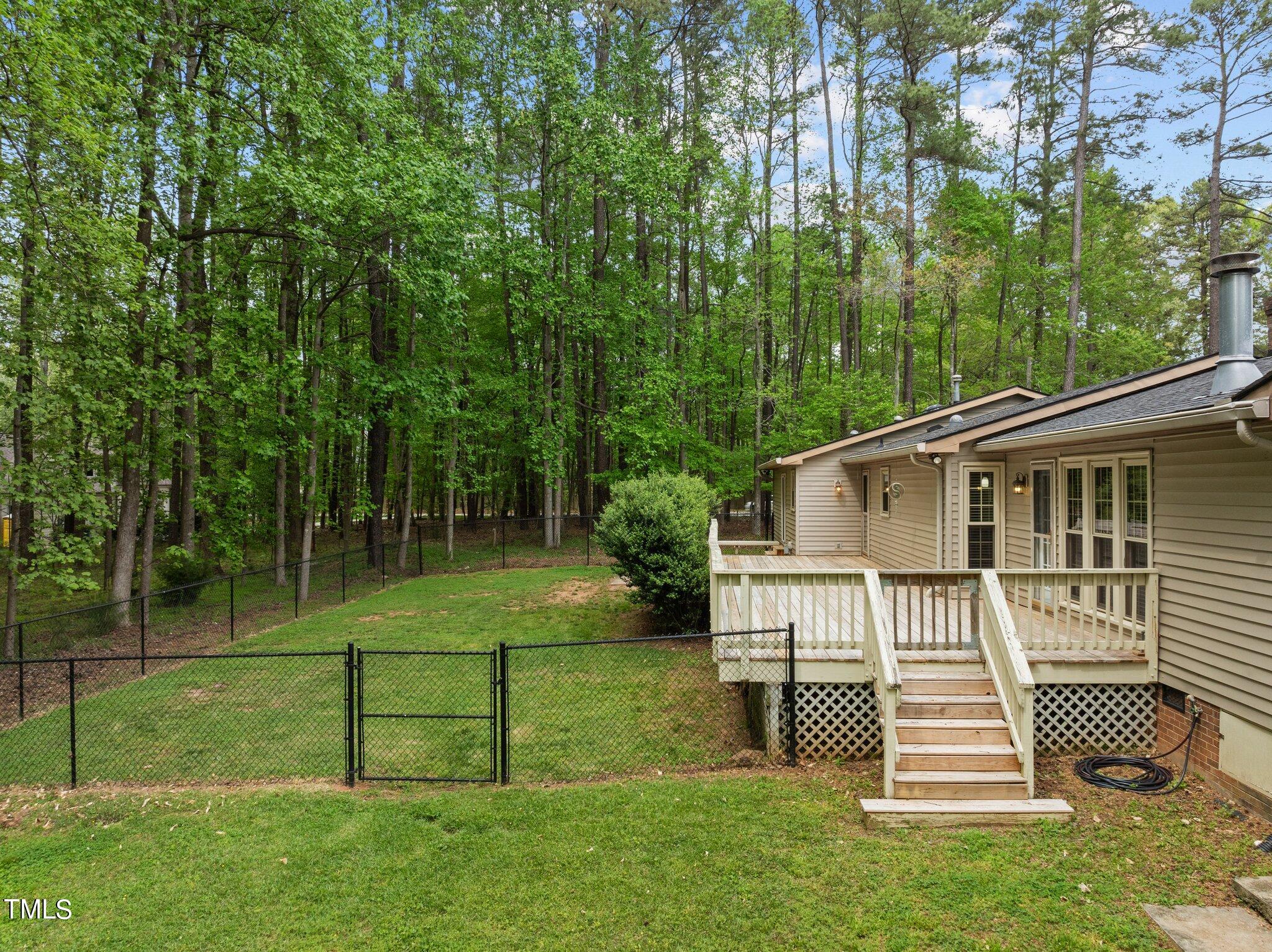 1901 Nipper Road Raleigh, NC 27614 - Photo 45 of 57 a front view of a house with a yard