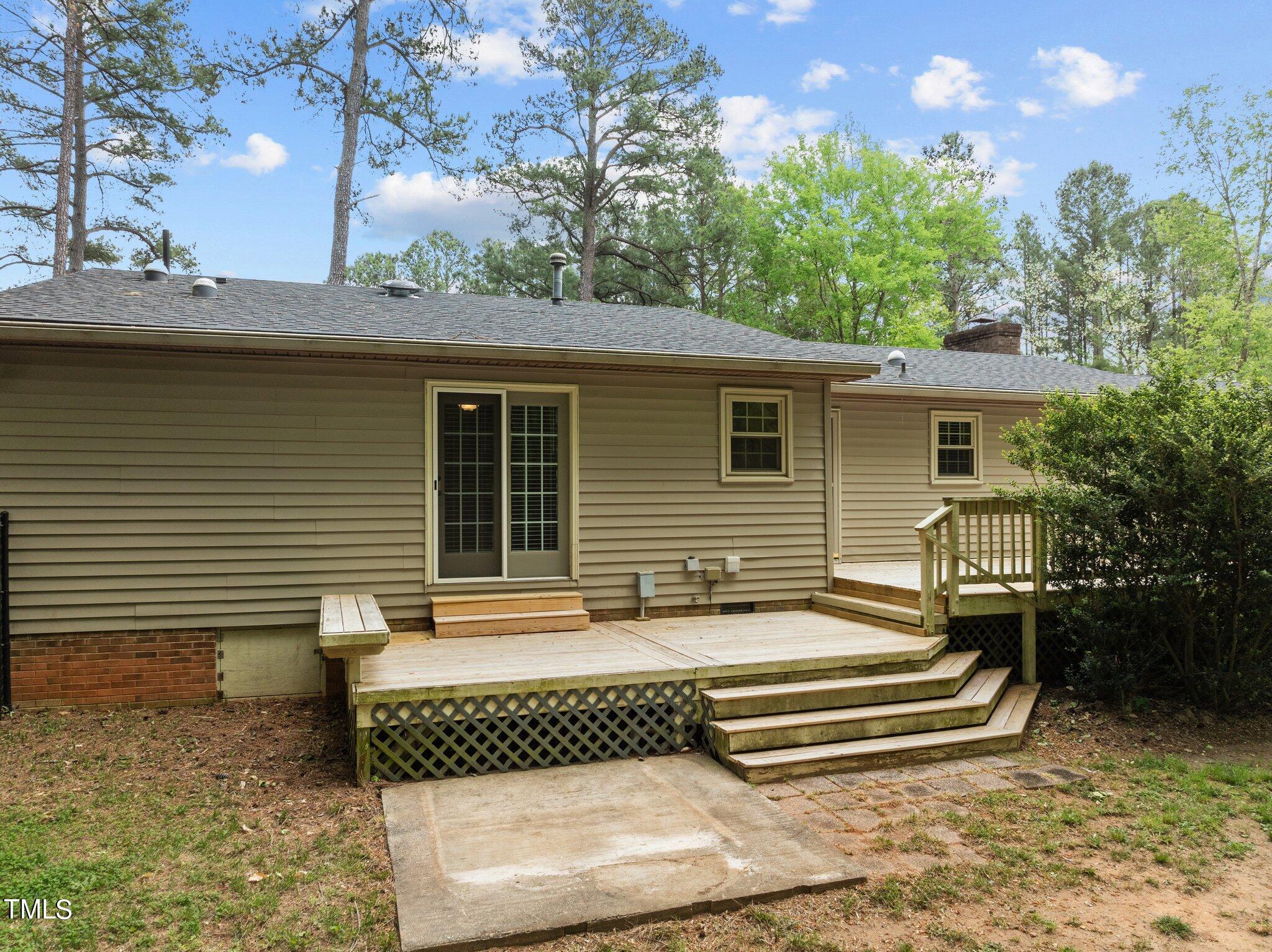 1901 Nipper Road Raleigh, NC 27614 - Photo 47 of 57 a front view of a house with a garden