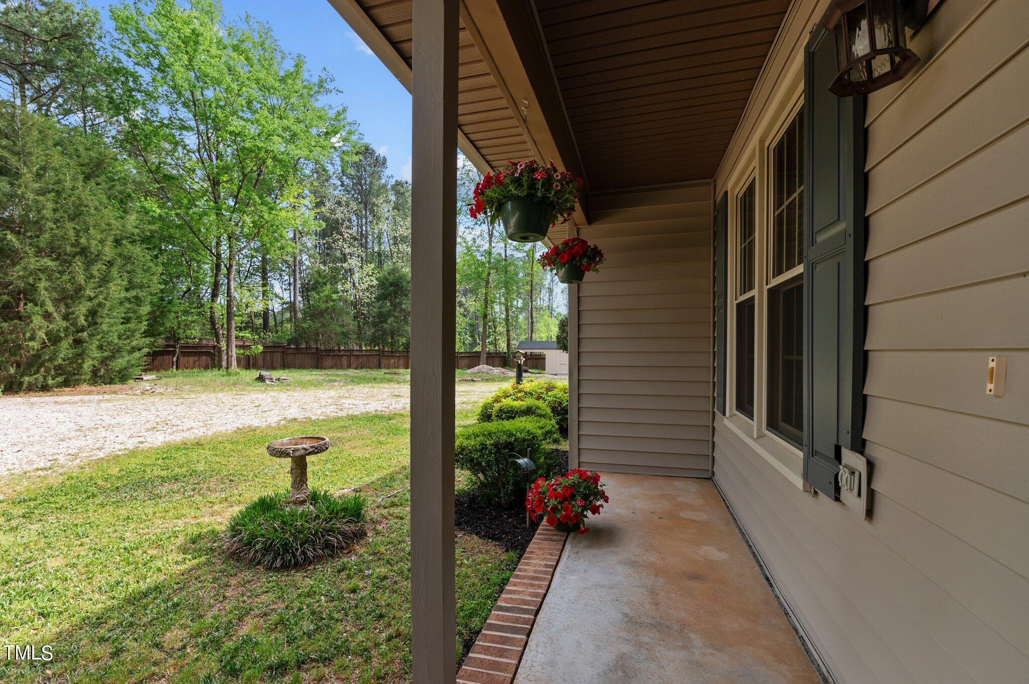 1901 Nipper Road Raleigh, NC 27614 - Photo 5 of 57 a view of a backyard with garden