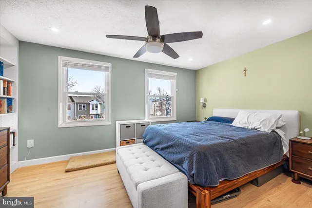 a bedroom with a bed and dresser