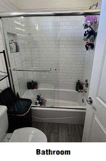 12322 Champlin Place Bakersfield, CA 93311 - Photo 16 of 33 a bathroom with a sink a toilet and a shower