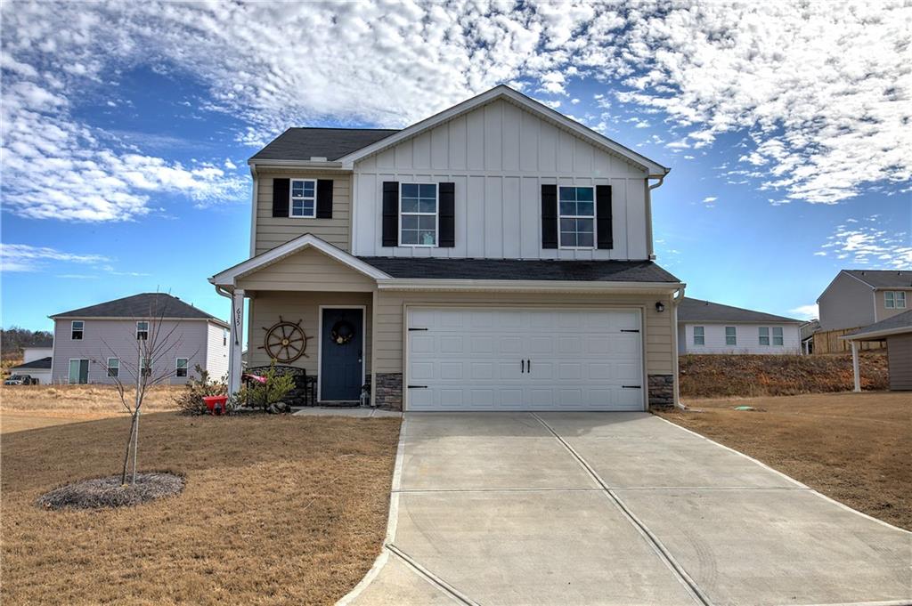 635 Tudor Street Euharlee, GA 30145 - Photo 38 of 39 a view of a yard in front of a house