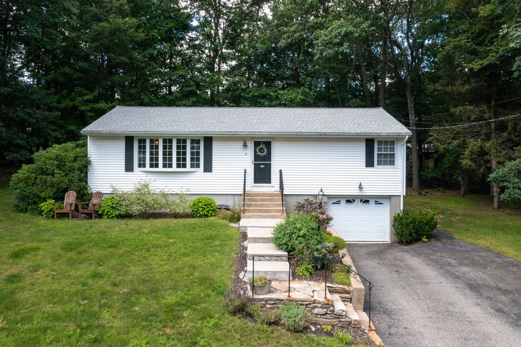 8 Juniper Lane Rutland, MA 01543 - Photo 1 of 36 a front view of a house with garden