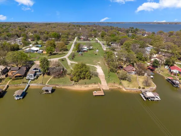 a view of backyard with a garden and deck