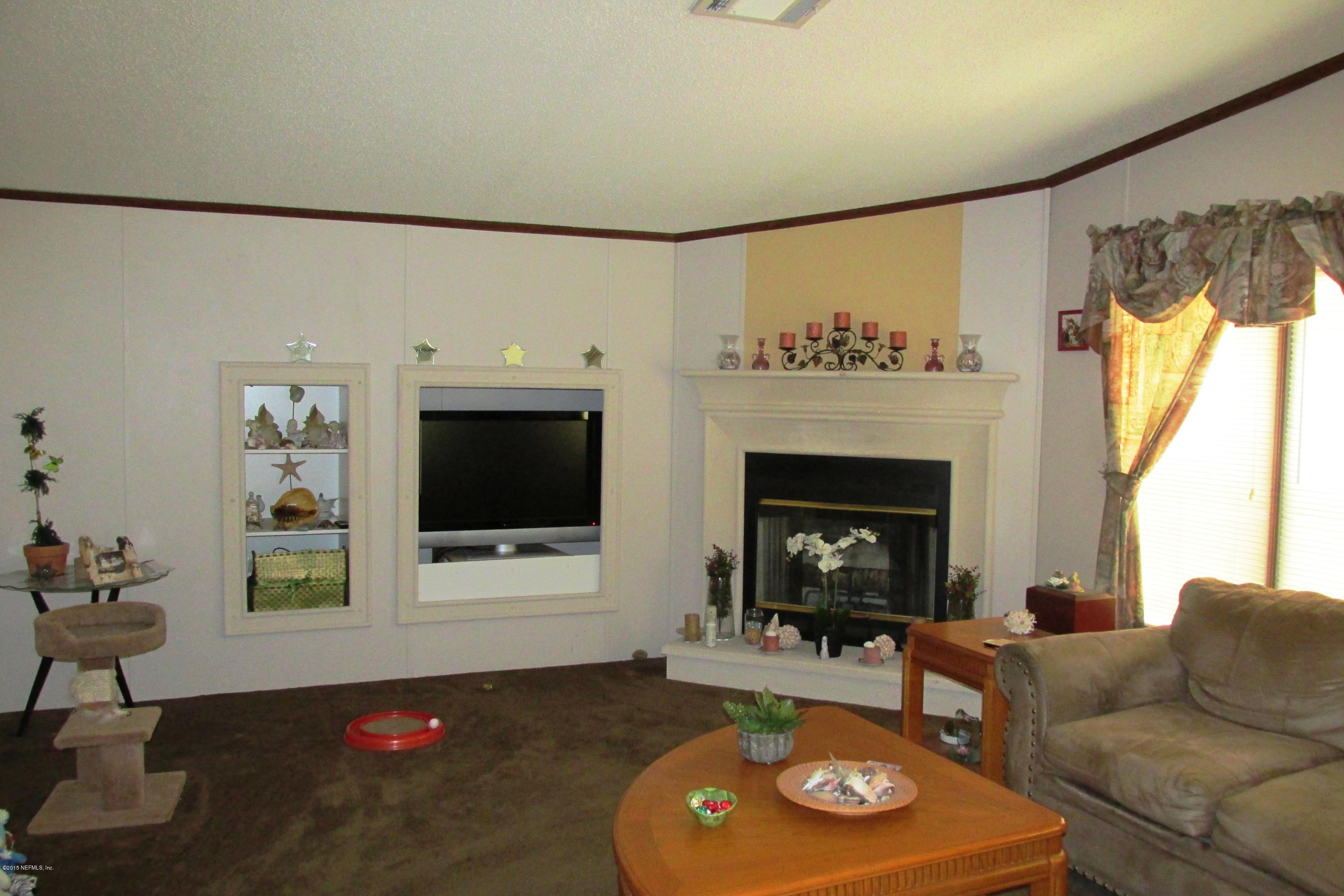 5085 Pinon Road Keystone Heights, FL 32656 - Photo 6 of 9 Family Room Fireplace