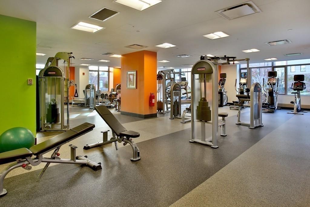 303 Third Street, Unit 417 Cambridge, MA 02142 - Photo 18 of 22 a view of a room with gym equipment