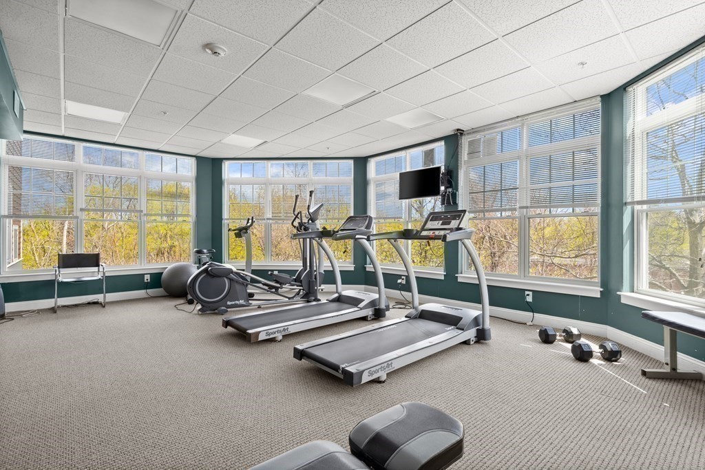 35 Commonwealth Avenue, Unit 103 Newton, MA 02467 - Photo 18 of 23 a view of a room with gym equipment