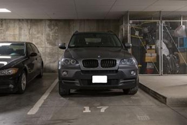 35 Commonwealth Avenue, Unit 103 Newton, MA 02467 - Photo 19 of 23 a car parked in a garage