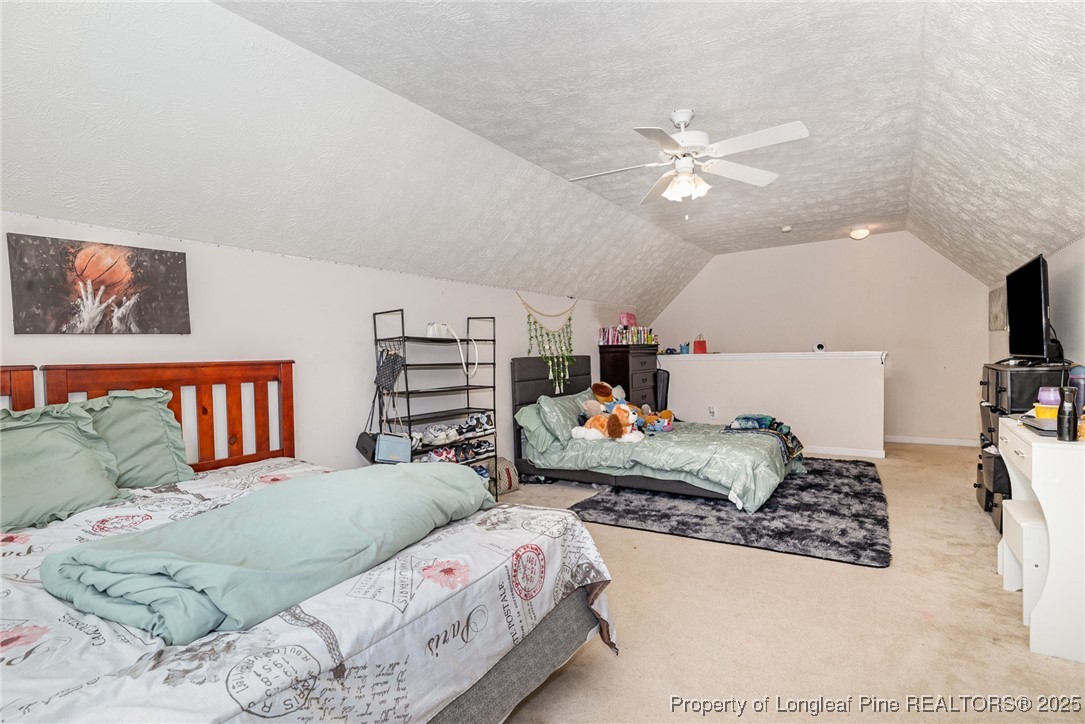 615 Bramblegate Road Hope Mills, NC 28348 - Photo 21 of 26 a bedroom with furniture and a large window