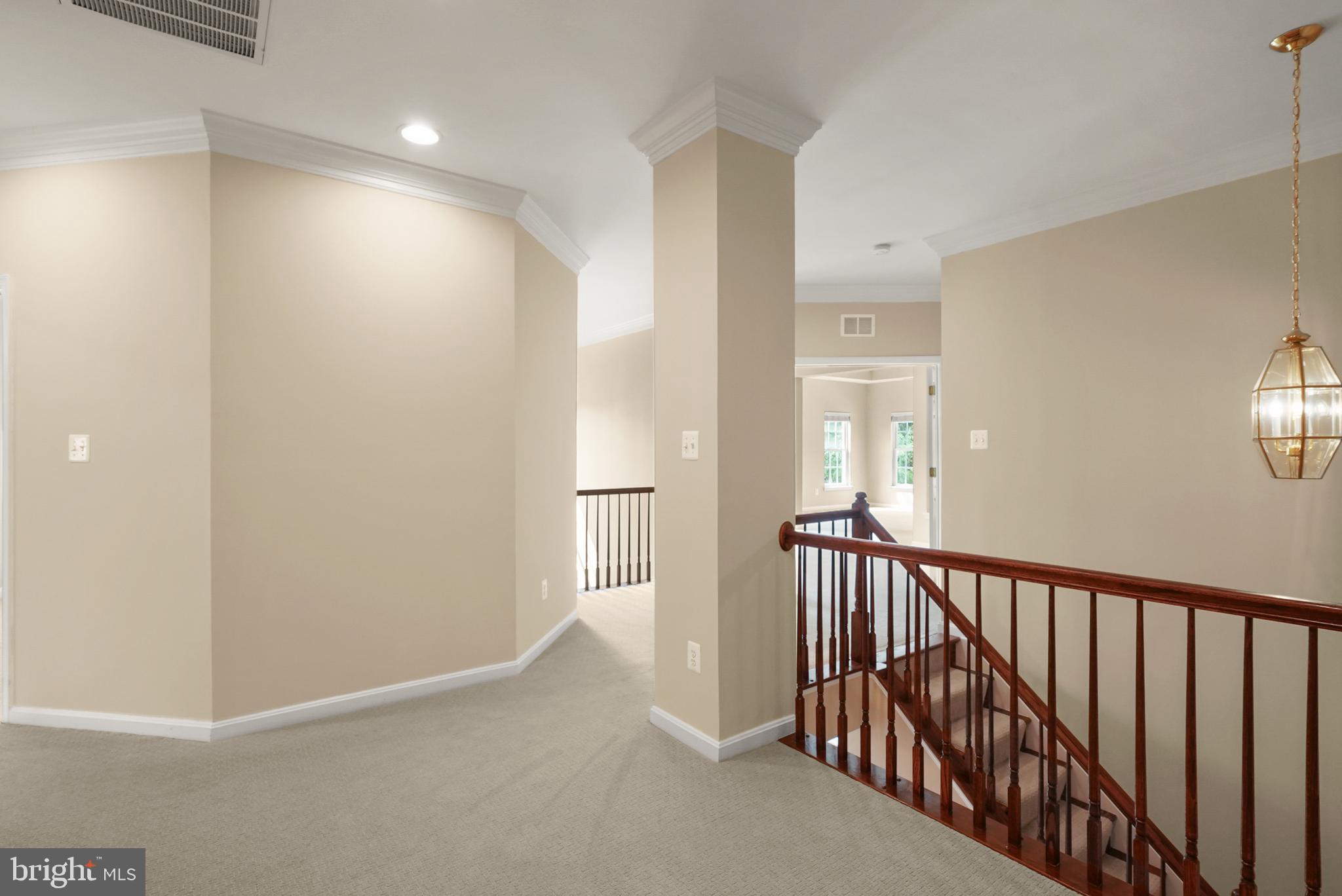 43616 Carradoc Farm Terrace Leesburg, VA 20176 - Photo 27 of 63 a view of a hallway with windows