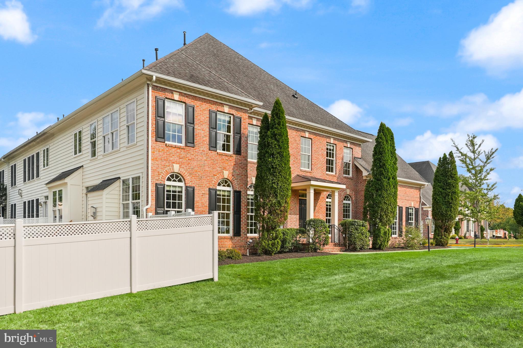43616 Carradoc Farm Terrace Leesburg, VA 20176 - Photo 3 of 63 a front view of a house with a garden