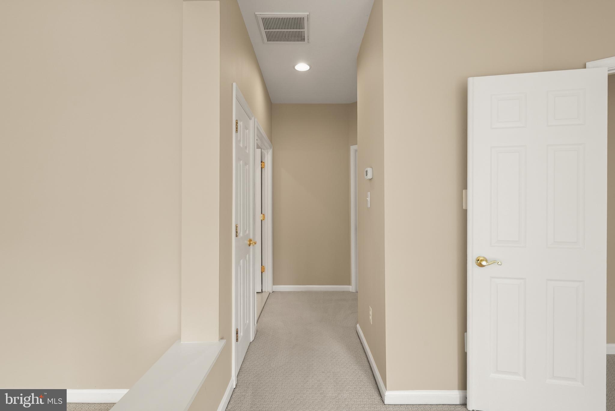43616 Carradoc Farm Terrace Leesburg, VA 20176 - Photo 33 of 63 a view of a hallway with wooden floor