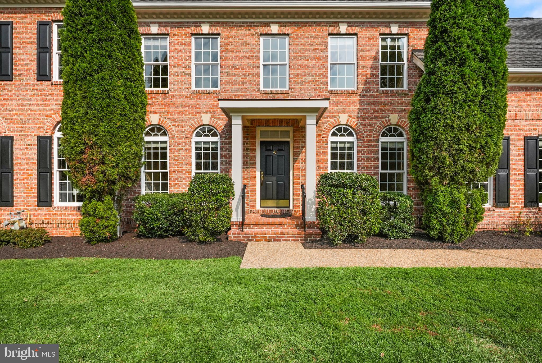 43616 Carradoc Farm Terrace Leesburg, VA 20176 - Photo 4 of 63 front view of a house with a yard