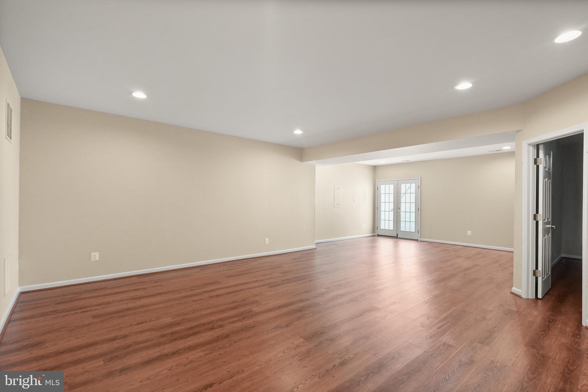 43616 Carradoc Farm Terrace Leesburg, VA 20176 - Photo 43 of 63 a view of empty room with wooden floor and fan