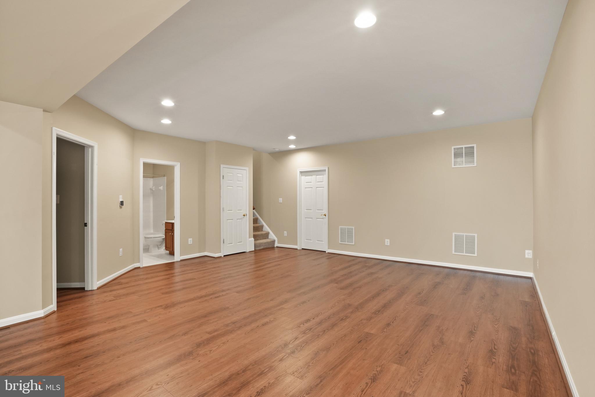 43616 Carradoc Farm Terrace Leesburg, VA 20176 - Photo 46 of 63 a view of an empty room with wooden floor and closet