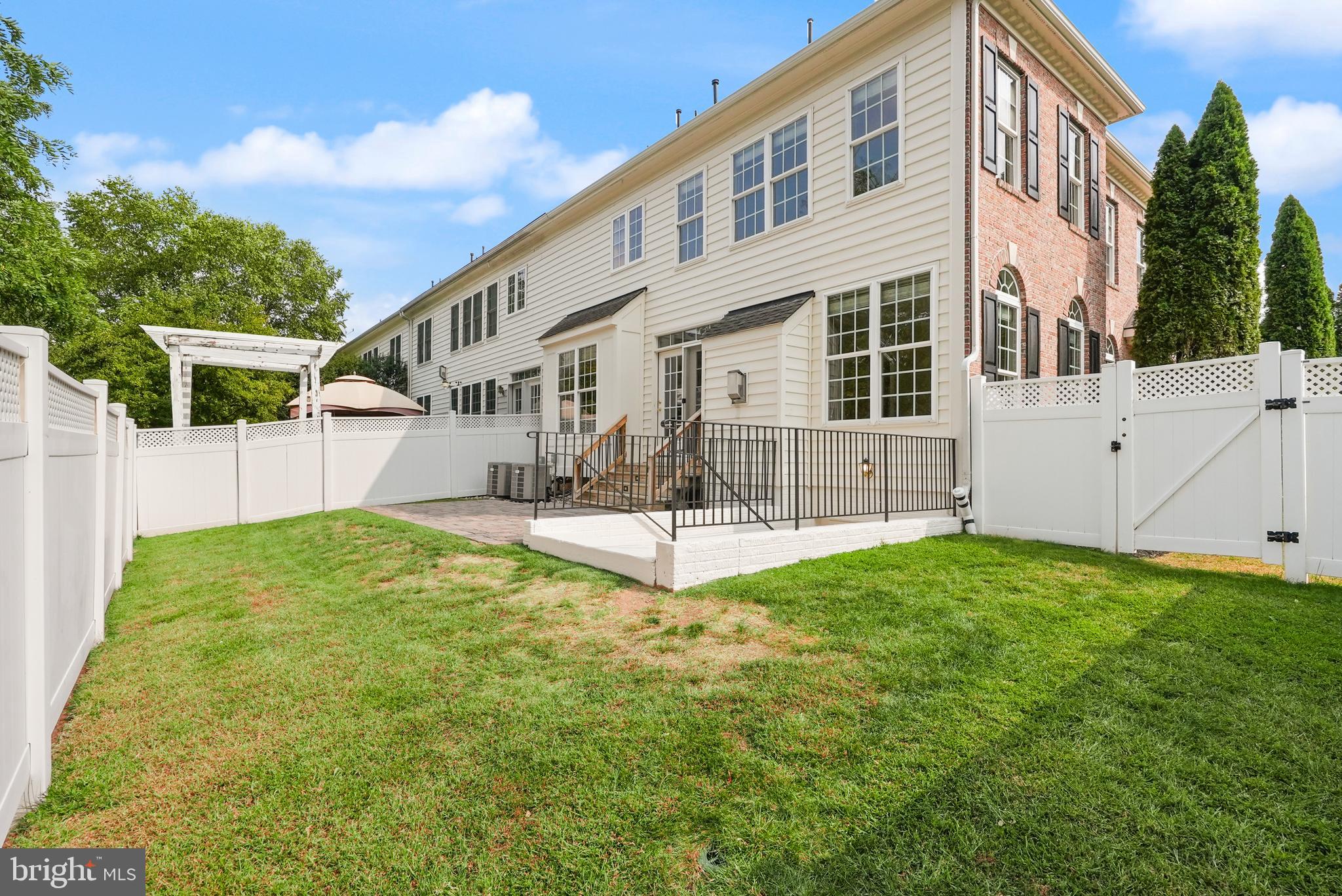43616 Carradoc Farm Terrace Leesburg, VA 20176 - Photo 59 of 63 a view of a house with backyard and sitting area
