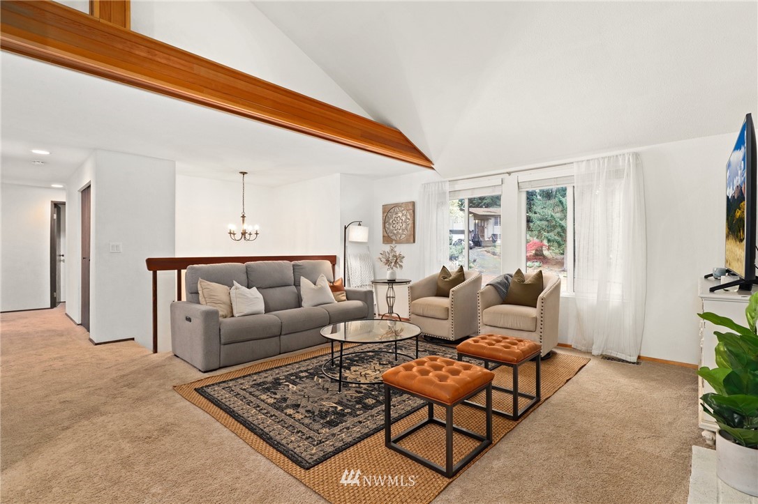 3305 199th Place Southeast Bothell, WA 98012 - Photo 2 of 39 a living room with furniture and a rug