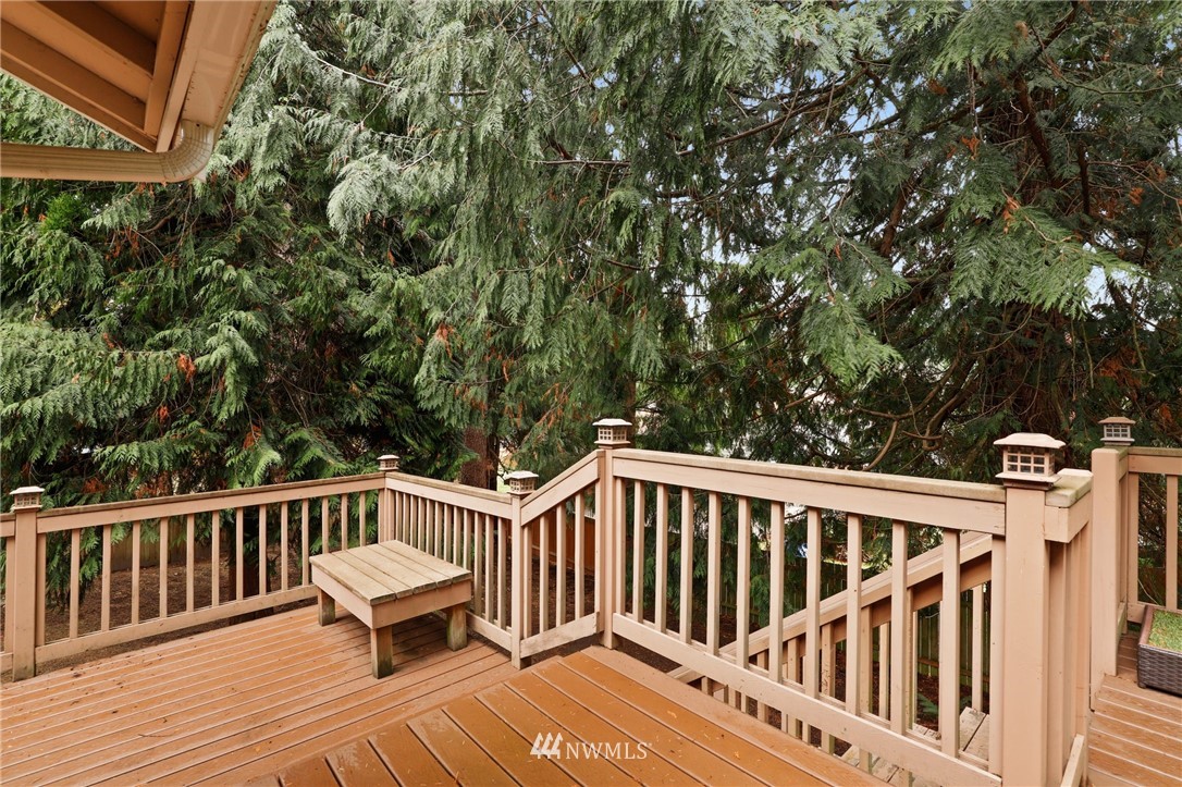 3305 199th Place Southeast Bothell, WA 98012 - Photo 13 of 39 a view of a wooden bench on the deck