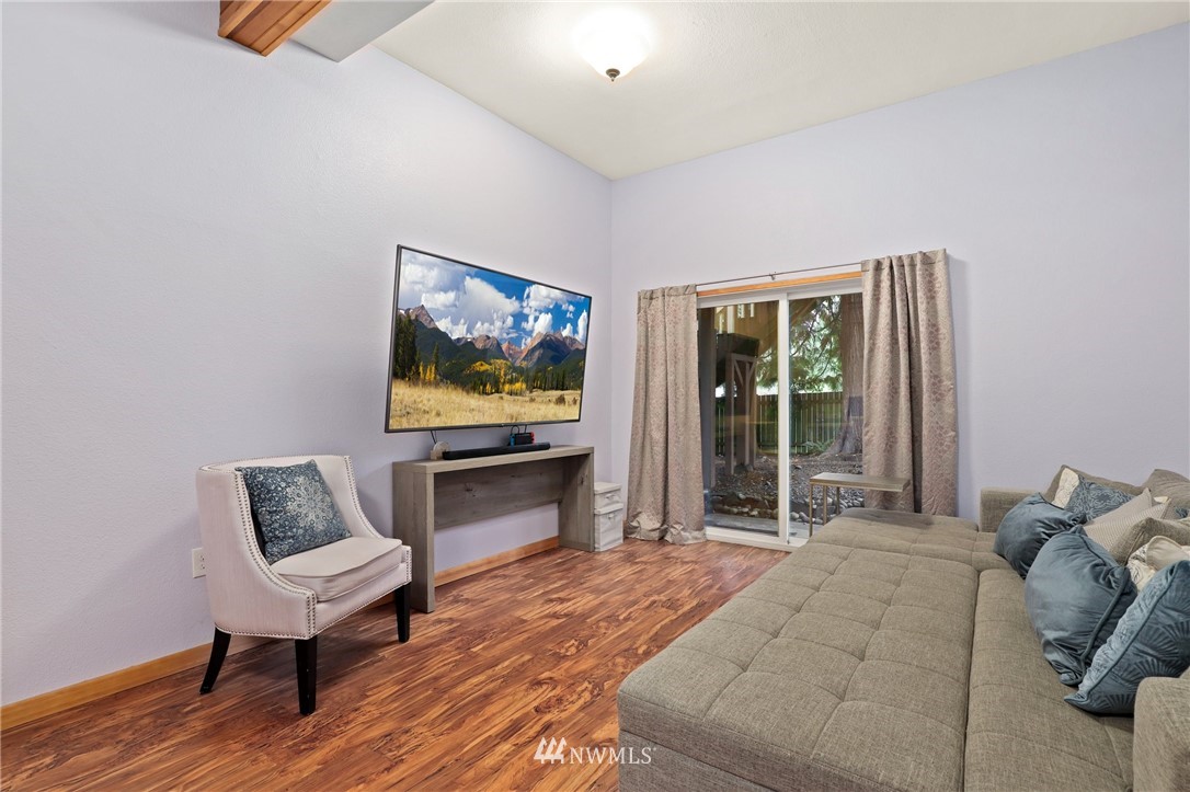3305 199th Place Southeast Bothell, WA 98012 - Photo 21 of 39 a living room with furniture and a window