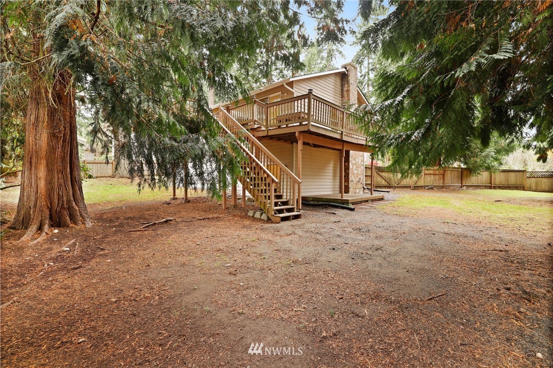3305 199th Place Southeast Bothell, WA 98012 - Photo 28 of 39 a view of a house with a yard