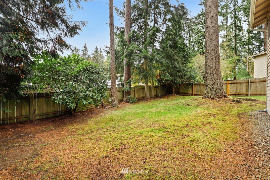 3305 199th Place Southeast Bothell, WA 98012 - Photo 32 of 39 a view of a backyard with a small cabin