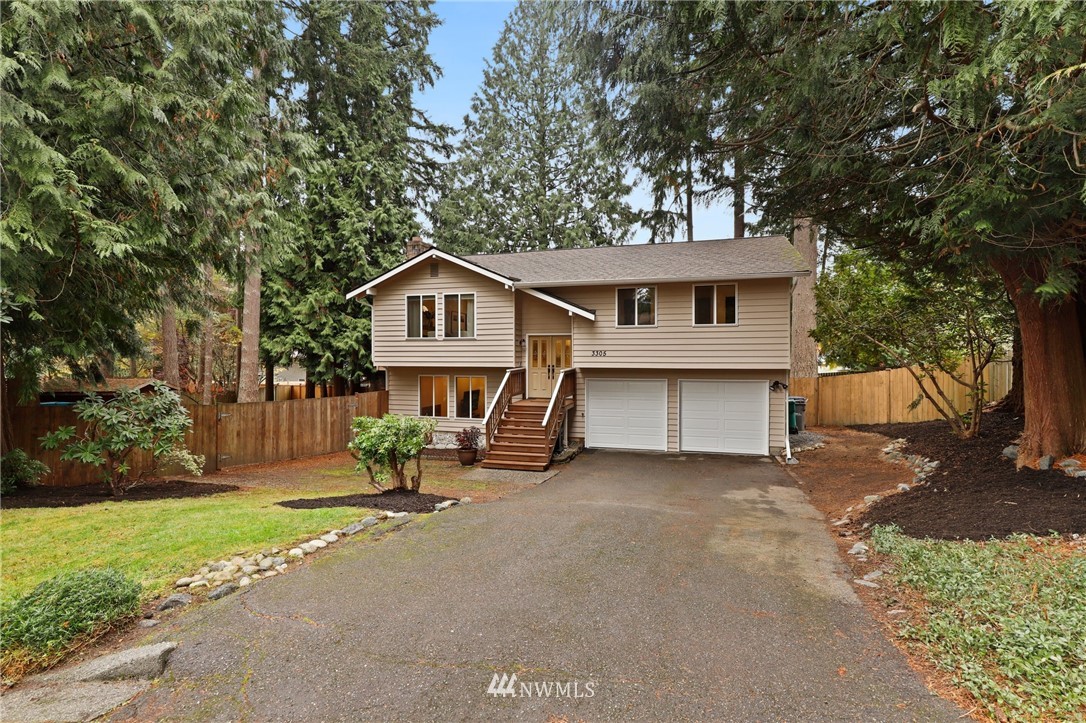 3305 199th Place Southeast Bothell, WA 98012 - Photo 38 of 39 a view of a house with a patio and a yard
