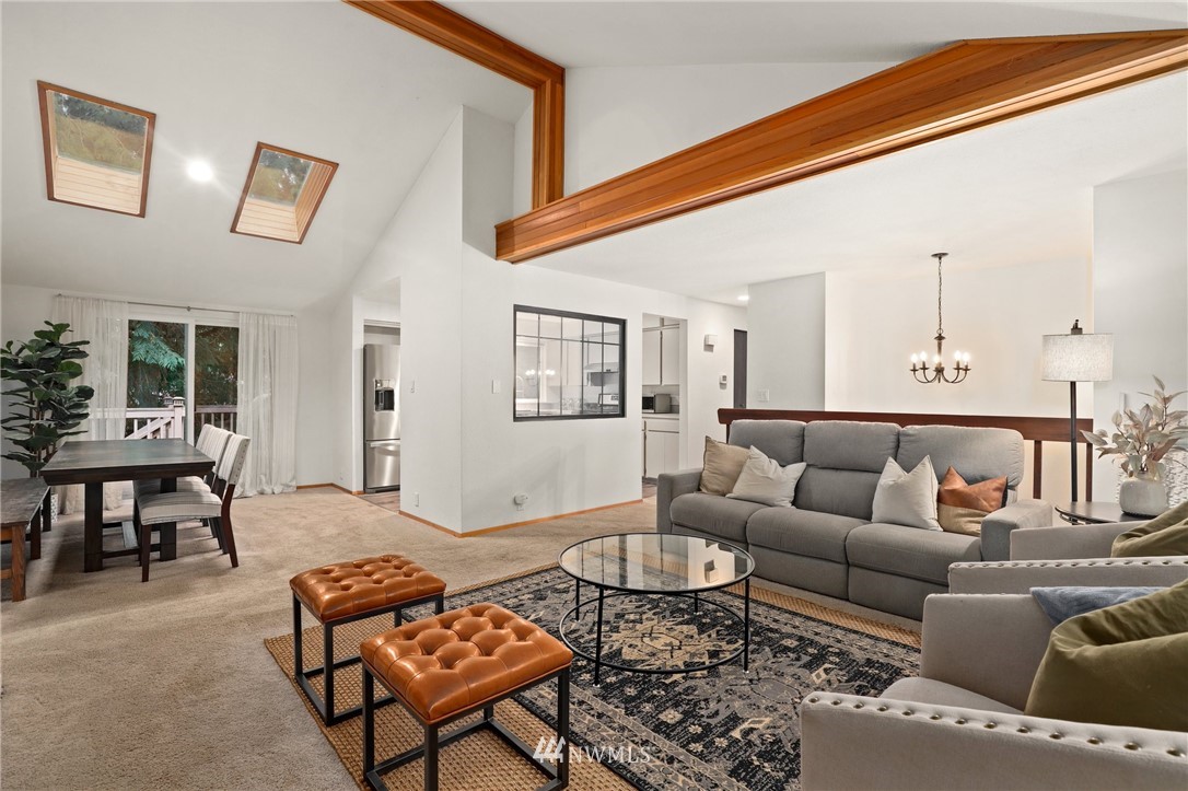 3305 199th Place Southeast Bothell, WA 98012 - Photo 5 of 39 a living room with furniture and a rug