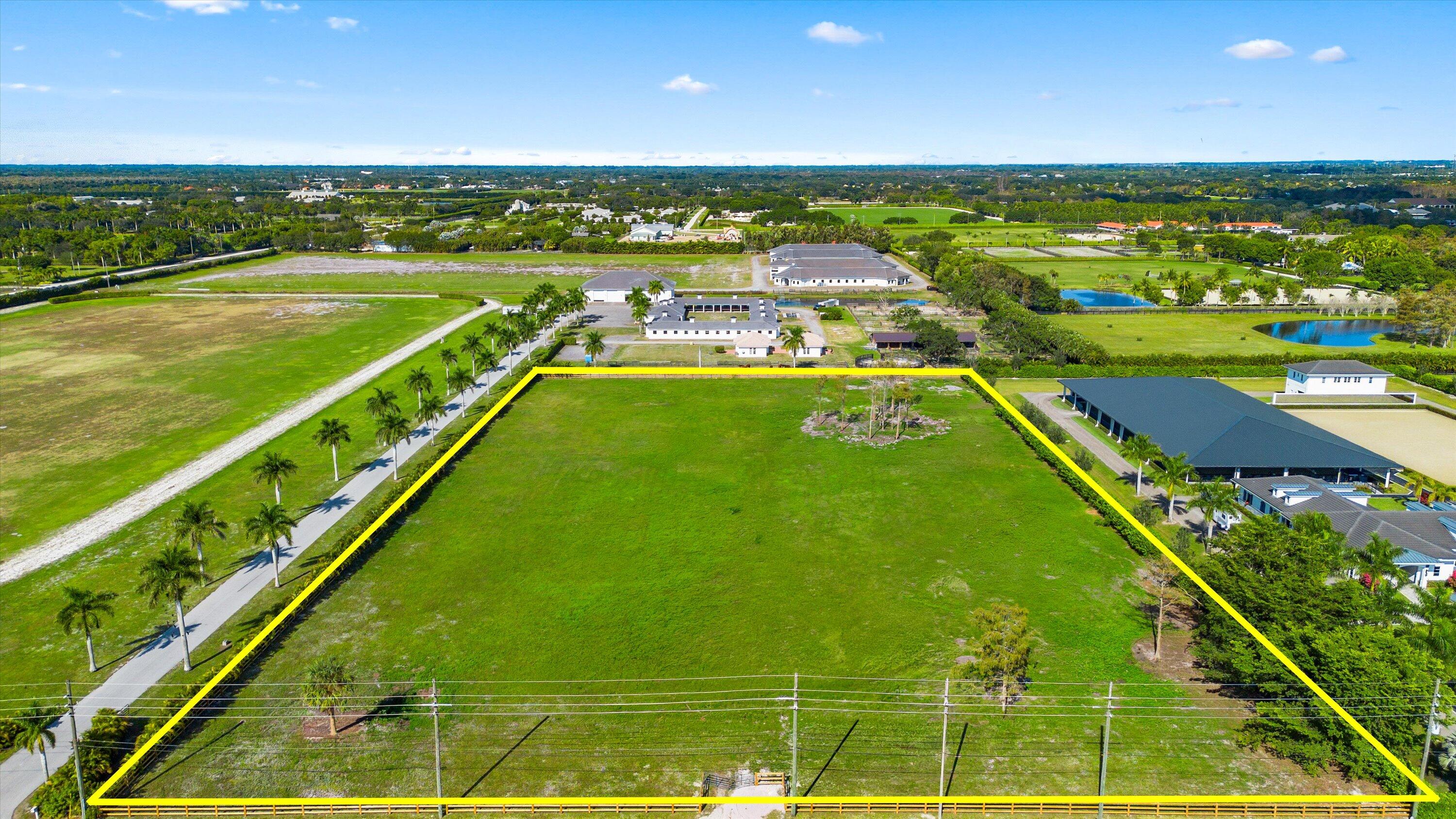12875 50th Street South Wellington, FL 33449 - Photo 2 of 7 a view of swimming pool from a balcony