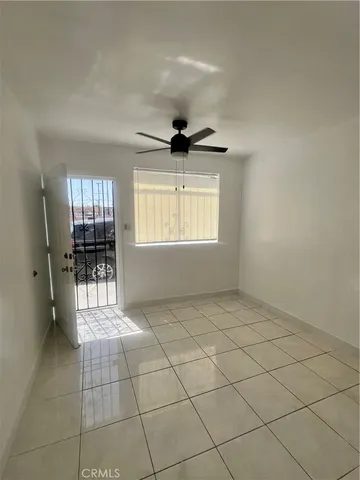 a view of an empty room and window