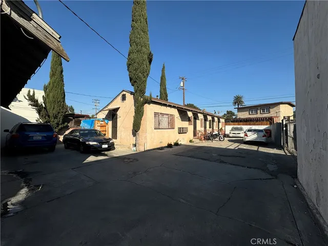 a view of multiple house with a street