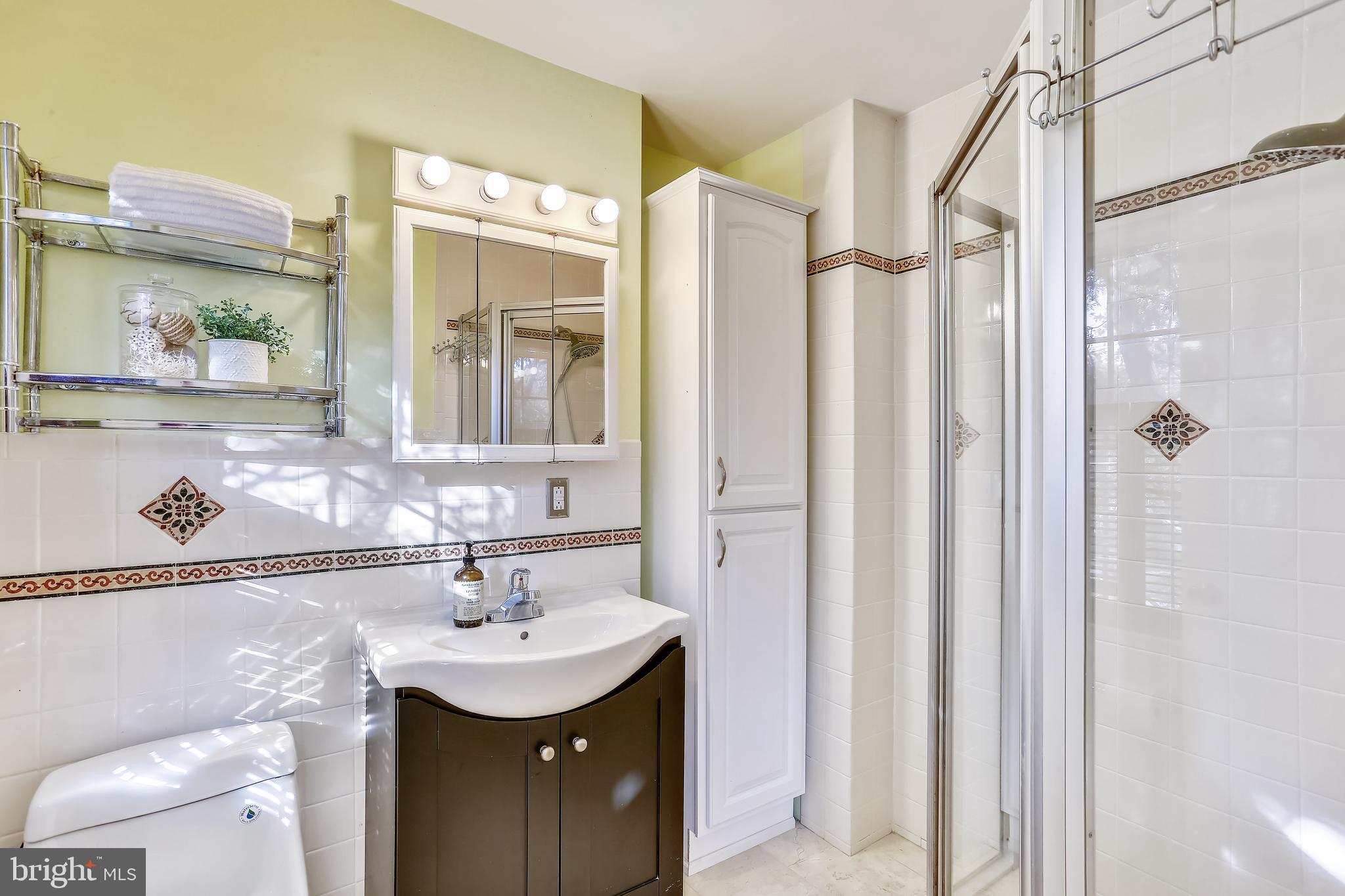 44 Oak Shade Road Gaithersburg, MD 20878 - Photo 21 of 41 Renovated en-suite primary bath
