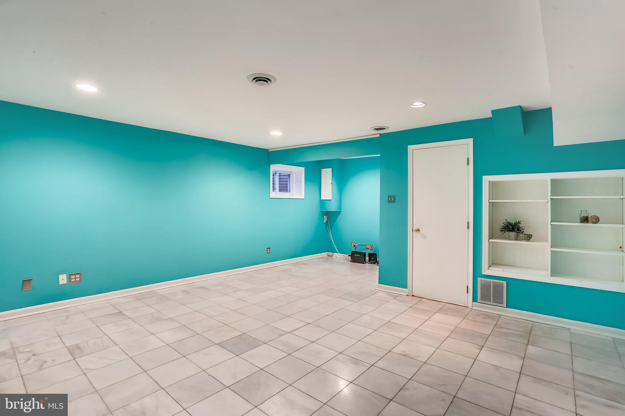 44 Oak Shade Road Gaithersburg, MD 20878 - Photo 31 of 41 Lower level rec room w/marble floor
