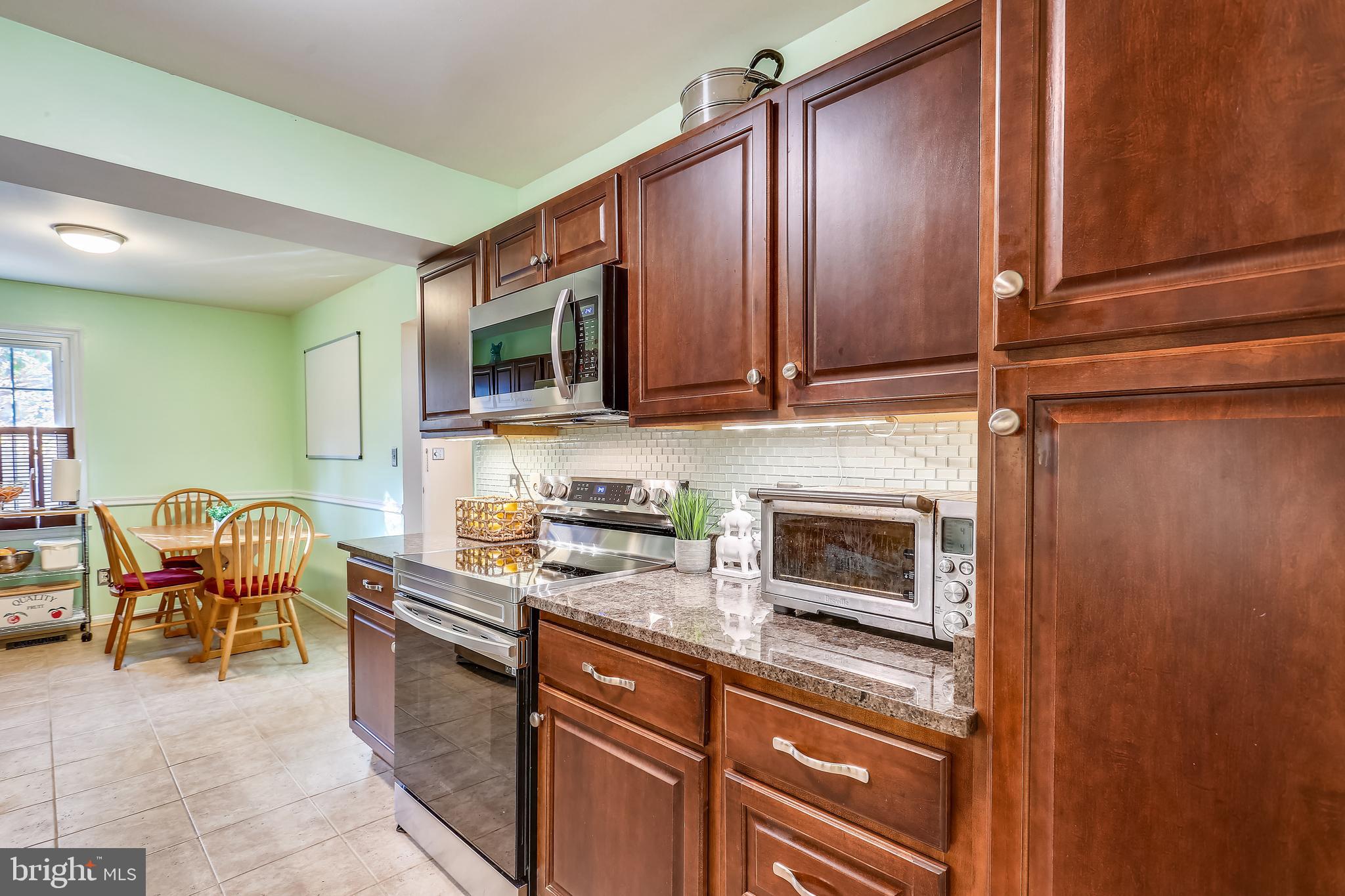 44 Oak Shade Road Gaithersburg, MD 20878 - Photo 7 of 41 Kitchen sparkles w/granite and stainless