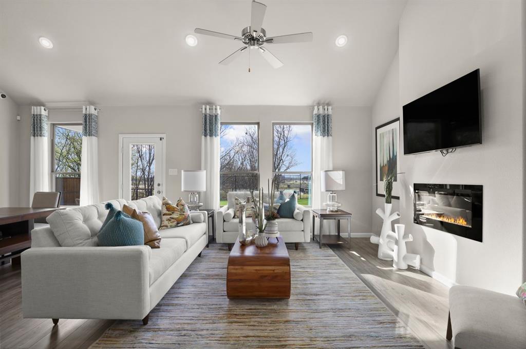 676 Poppy Lane Lavon, TX 75166 - Photo 14 of 35 Living room in the Masters home plan by Trophy Signature Homes – REPRESENTATIVE PHOTO