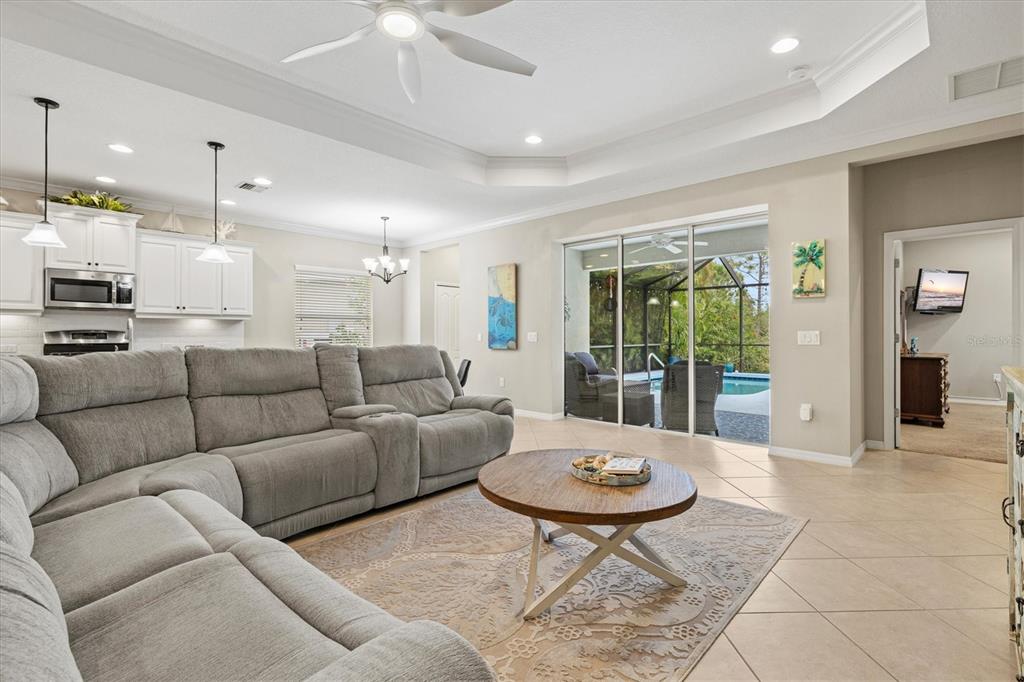 11610 Marathon Circle Venice, FL 34293 - Photo 13 of 84 a living room with furniture and a table