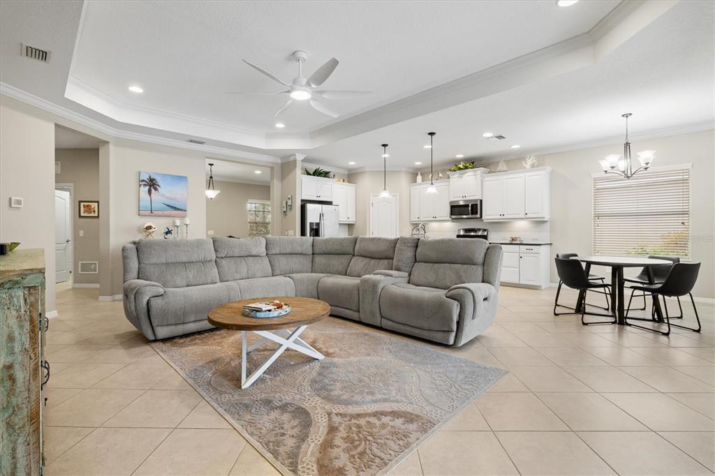 11610 Marathon Circle Venice, FL 34293 - Photo 14 of 84 a living room with furniture and kitchen view