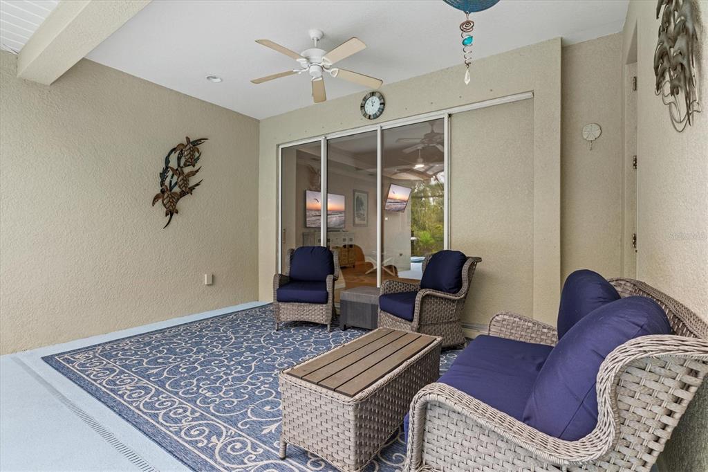 11610 Marathon Circle Venice, FL 34293 - Photo 28 of 84 a living room with furniture and wooden floor