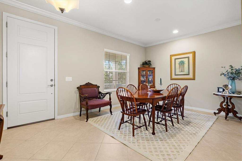 11610 Marathon Circle Venice, FL 34293 - Photo 7 of 84 a view of a dining room with furniture