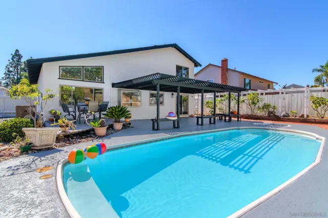 a view of a street with benches in the background